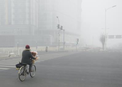 biking through smog in Beijing